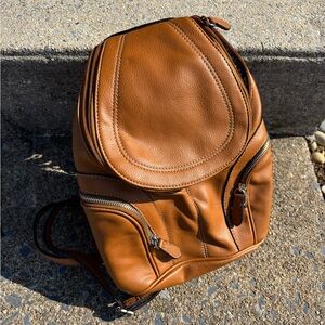 Nine West Tan Leather Sling Backpack with Multiple Zip Pockets